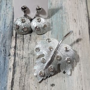 Silver Earring and brooch set.
